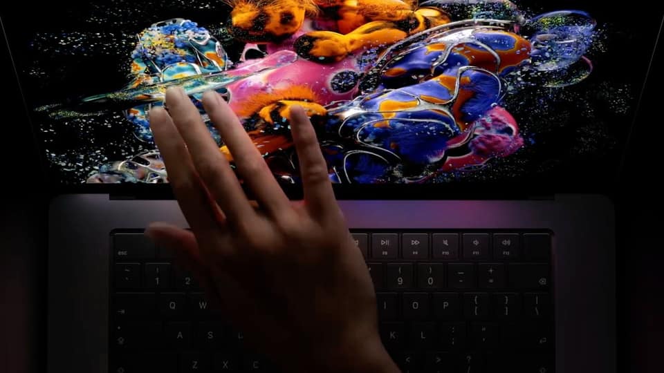 MacBook Pro gets touchscreen OLED, and resurrects the glowing Apple logo